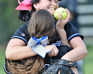 Jeff Lange | The Vindicator WED, MAY 11, 2016 - Lakeview third baseman Kylee Mann (facing) leaps into the arms of first baseman Tori Wells after defeating Girard, 4-3, Wednesday afternoon at Lakeview High School.