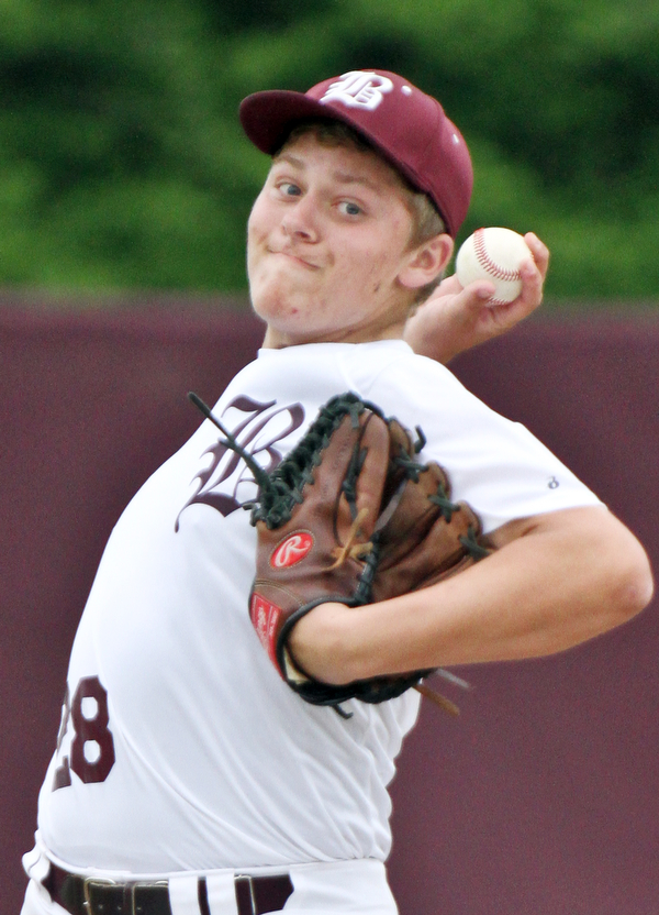 Williiam D Lewis the vindicator Boardman pitcher Hudson Widrig(28) check spelling  delivers during  win over Warren Harding at Boardman May 12-16.