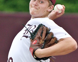 Williiam D Lewis the vindicator Boardman pitcher Hudson Widrig(28) check spelling  delivers during  win over Warren Harding at Boardman May 12-16.