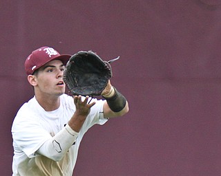 Williiam D Lewis the vindicator Boardman Luke Cardillo (120 catches a flyball during  win over Warren Harding at Boardman May 12-16.