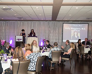 SPECIAL TO THE VINDICATOR | The Alzheimer’s Association Greater East Ohio Area Chapter hosted its “Paint the Night Purple” benefit dinner and auction April 16 at the Lake Club in Poland. Howland neurologist Holly Maggiano, M.D., above, was honored with the 2016 Champion Award for her compassion- ate and holistic approach to working with persons will Alzheimer’s disease and their families. More than 180 attended the event and a por- tion of the proceeds will go to Alzheimer’s research. It is estimated that 5.4 million Americans have Alzheimer’s and nearly 16 million family members and friends are caregivers. The full text of the Alzheimer’s Association 2016 Disease Facts and Figures report can be viewed at alz.org. For information on local programs and services, visit alz.org/akroncantonyoungstown.