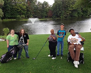 SPECIAL TO THE VINDICATOR | The 13th annual Golden String Drive for the Disabled will take place June 10 at Knoll Run Golf Course in Lowellville. The nonprofit organization is seeking donations for a basket auction in conjunction with the event. Hole sponsorships also are available for $125. Anyone interested in participating in the event or purchasing a sponsorship should call Adrienne Liguore, 330-207-5949. Among those preparing for the golf outing above are, from left, Danny Kerr, Nikki Taub, Brian Rella and Tommy Hyder.