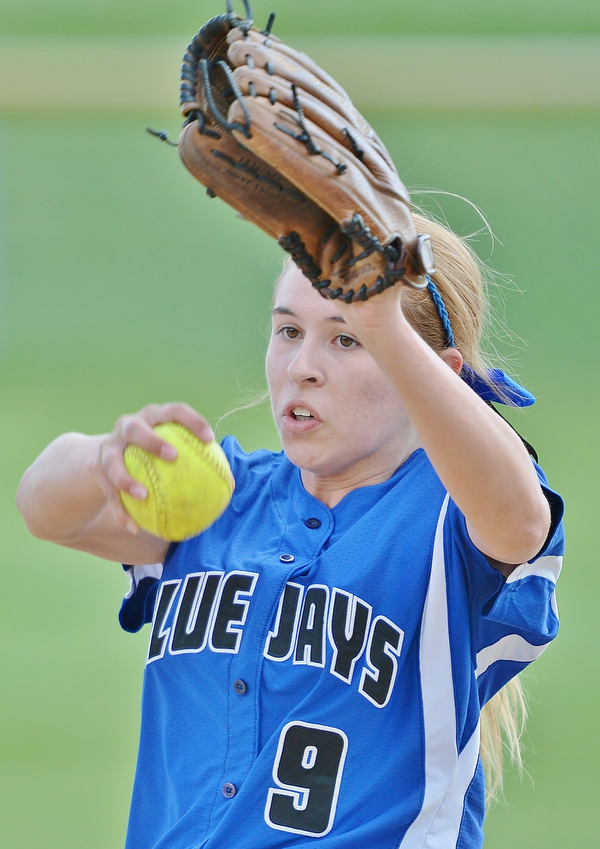 Jeff Lange | The Vindicator  FRI, MAY 13, 2016 - Blue Jays starting pitcher Sierra Pierce winds up a pitch for a Lowellville batter early in Friday's game at Jackson-Milton High School.