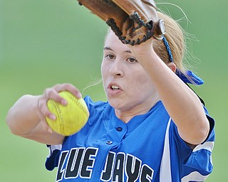 Jeff Lange | The Vindicator  FRI, MAY 13, 2016 - Blue Jays starting pitcher Sierra Pierce winds up a pitch for a Lowellville batter early in Friday's game at Jackson-Milton High School.