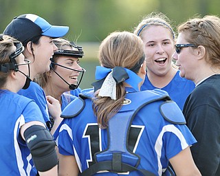 Jeff Lange | The Vindicator  FRI, MAY 13, 2016 - In the final moments of their game against Lowellville, members of the Blue Jays infield share a moment of laughter with coach Kelly Snowden Friday afternoon at Jackson-Milton High School. Jackson-Milton defeated Lowellville 8-1.