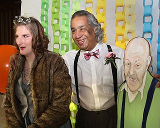 William D. Lewis The Vindicator Purple Cat clients Hillary Shutrump of Boardman and Jimmy Febres of Youngstown pose for a photo with a cutout of Joe Gallgher during Purple Cat Prom held at St. Nick's Hall in Struthers 5-14-16. Gallagher was Purple Cat's first client and died about 5 years ago. The prom was held on what would have been Gallgher's 74 th birthday.