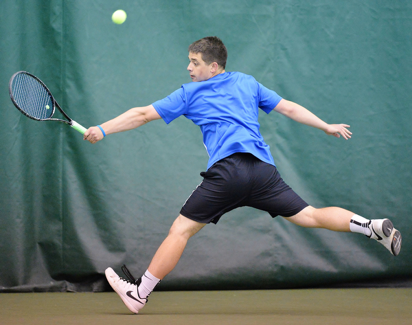 Jeff Lange | The Vindicator  SAT, MAY 14, 2016 - Lakeview's #1 seed Zack Teffner backhands the ball back over the net during a match against #2 seed Les Horvath of Ursuline Saturday morning at Boardman Tennis Center.