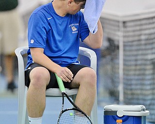 Jeff Lange | The Vindicator  SAT, MAY 14, 2016 - Lakeview's Zack Teffner wipes the sweat from his forehead in between sets during Saturday's tennis match at Boardman Tennis Center.