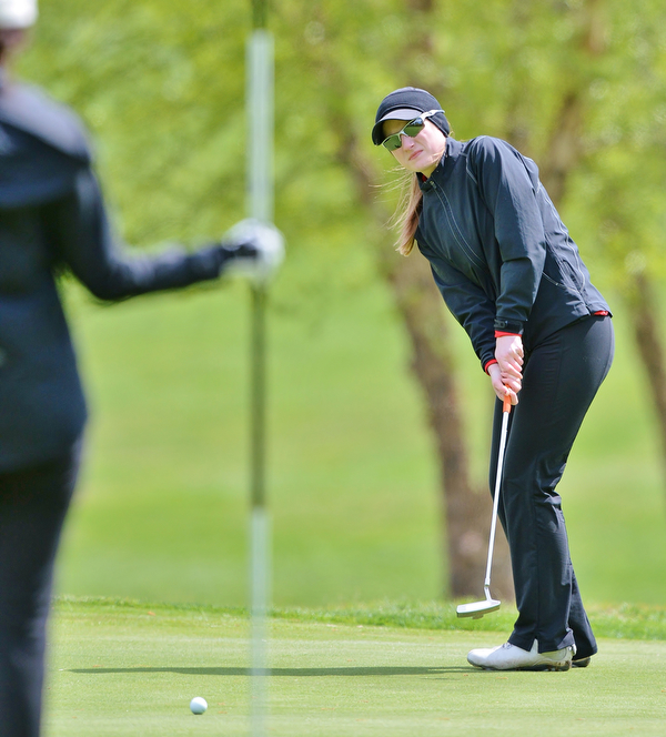 Jeff Lange | The Vindicator  SUN, MAY 15, 2016 - Canfield's Hannah Keffler putts to the pin at hole three Sunday afternoon during the Greatest Golfer of the Valley junior event in Vienna.