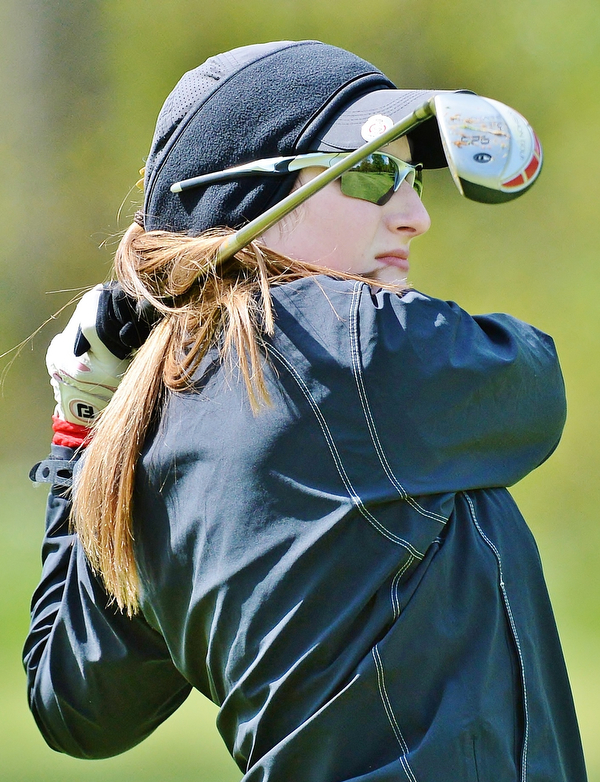 Jeff Lange | The Vindicator  SUN, MAY 15, 2016 - Canfield's Hannah Keffler watches her approach shot from the fourth fairway during Sunday's Greatest Golfer of the Valley junior event in Vienna.