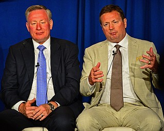 YOUNGSTOWN, OHIO - MAY 16, 2016: Bob Stoops tells a story about growing up in Youngstown while sitting next to his brother Ron Stoops Monday evening during the Champions Among Us Banquet at the Lake Club. DAVID DERMER | THE VINDICATOR