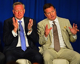 YOUNGSTOWN, OHIO - MAY 16, 2016: Bob Stoops tells a story about growing up in Youngstown while sitting next to his brother Ron Stoops Monday evening during the Champions Among Us Banquet at the Lake Club. DAVID DERMER | THE VINDICATOR