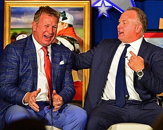 YOUNGSTOWN, OHIO - MAY 16, 2016: Mike Stoops (left) and Mark Stoops (right) laugh on stage while telling a story Monday evening during the Champions Among Us Banquet at the Lake Club. DAVID DERMER | THE VINDICATOR