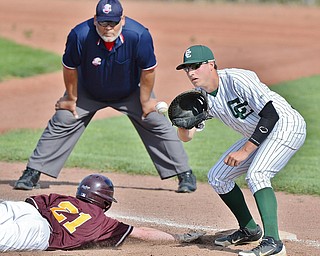 Jeff Lange | The Vindicator  MON, MAY 16, 2016 - South Range's Jack Bajerski (21) dives back to the bag as Canton Central Catholic first baseman Dan Platek looks to catch the throw from the mound in the fourth inning of Monday's district semifinal in Struthers.