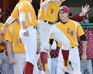 Jeff Lange | The Vindicator  MON, MAY 16, 2016 - Mooney's Dom Pecchia (left) and Bryce Richey celebrate after Pecchia scored a run in the fourth inning of Monday's district semifinal against Crestview at Cene Park.