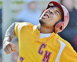 Jeff Lange | The Vindicator  MON, MAY 16, 2016 - Cardinal Mooney's Aaron Woodberry screams after scoring a run in the fourth inning of Monday's district semifinal game against Crestview at Cene Park.