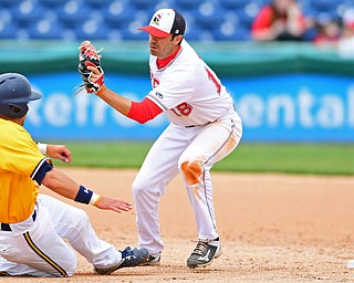 NILES, OHIO - MAY 17, 2016: Billy Salem #18 of YSU prepares to tag out Dom Iero #20 of Kent State as he attempts to steal second base in the fifth inning of Tuesday afternoons game at Eastwood Field. YSU won 11-10 in eleven innings. DAVID DERMER | THE VINDICATOR