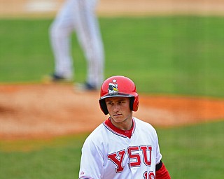 NILES, OHIO - MAY 17, 2016: Alex Larivee #19 of YSU steps on home plate after hitting a two run home run off Aaron Tadian #29 of Kent State in the eighth inning of Tuesday afternoons game at Eastwood Field. YSU won 11-10 in eleven innings. DAVID DERMER | THE VINDICATOR