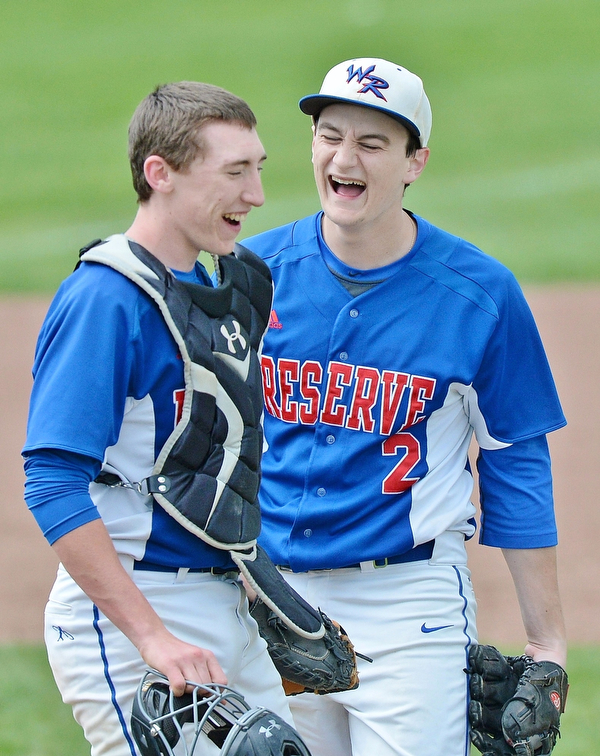 Jeff Lange | The Vindicator  TUE, MAY 17, 2016 - Western Reserve pitcher Jeep DiCioccio (2) shares a moment of laughter with catcher Ryan Slaven in between innings of Tuesday's DIV district semifinal against Lisbon at Bob Cene Park in Struthers. The Blue Devils defeated Lisbon, 6-1.