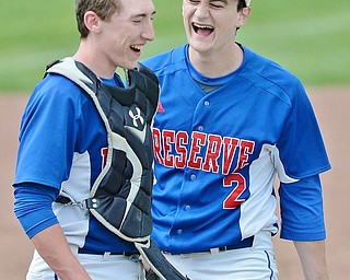Jeff Lange | The Vindicator  TUE, MAY 17, 2016 - Western Reserve pitcher Jeep DiCioccio (2) shares a moment of laughter with catcher Ryan Slaven in between innings of Tuesday's DIV district semifinal against Lisbon at Bob Cene Park in Struthers. The Blue Devils defeated Lisbon, 6-1.