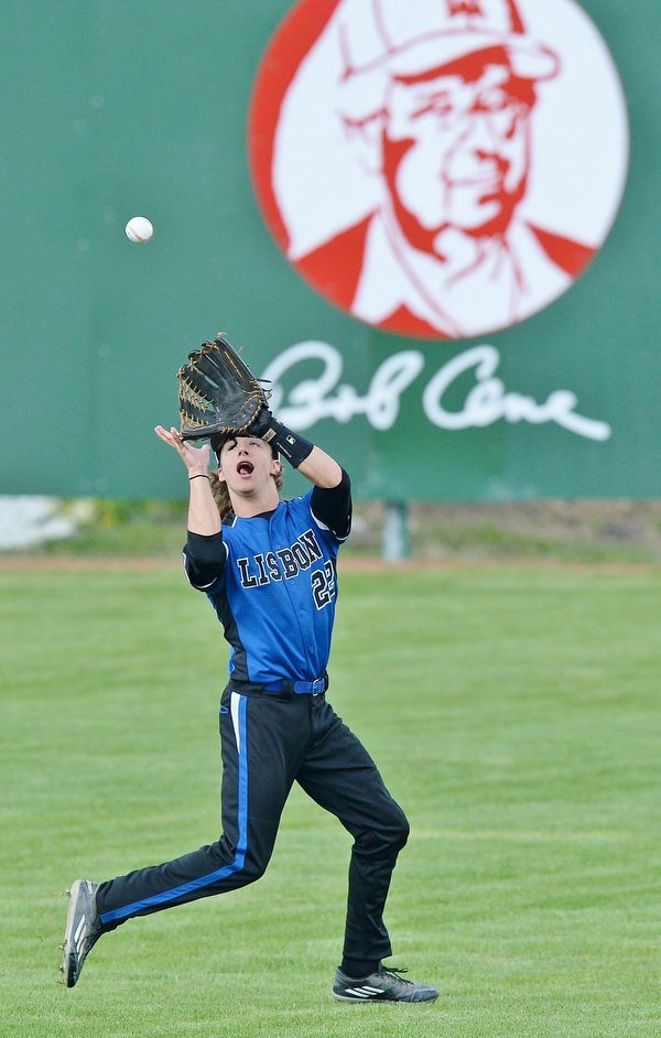 Jeff Lange | The Vindicator  TUE, MAY 17, 2016 - Lisbon centerfielder Colin Sweeney looks to catch a fly ball to end the second inning of Tuesday's DIV district semifinal game against Western Reserve at Bob Cene Park in Struthers.