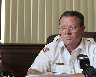 Nikos Frazier | The Youngstown Vindicator..Fire Chief John O'Neill talks with members of the media about Tuesday night's fire that killed Nakema Autry and her two children.