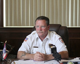 Nikos Frazier | The Youngstown Vindicator..Fire Chief John O'Neill talks with members of the media about Tuesday night's fire that killed Nakema Autry and her two children.
