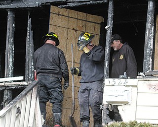   ROBERT K YOSAY | THE VINDICATOR.. Fire Chief John O'Neill says a preliminary investigation shows that the cause of a triple fatal fire late Tuesday on 1524 Bryson St. does not appear to be intentional. - ...--30-