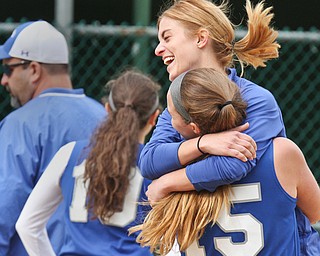 William d Lewis the vindicator Hubbard's Addy Jarvis(15) gets hug from her sister, assistant coach Amber Jarvis after Hubbard defeated West Branch 1-0 in 9 innings at alliance May 18,2016.