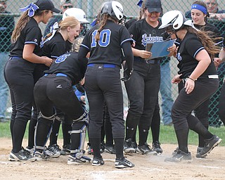 William d Lewis the vindicator  Lakeview's Tori Wells(21), right, gets congrats from team mates after hitting a home run during 05-08-16  7-1 win over Poland at Alliance.