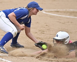 William D Lewis the Vindicator  Poland's Megan Marsico(10) tags Lakeview's Kylee Mann(17) out at first in lead off attempt during 5-18-16 game at Alliance.