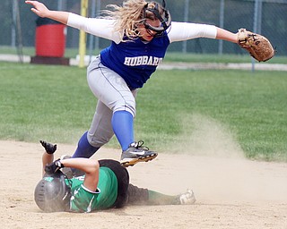 William d Lewis the vindicator West Branch's Maddie Pidgeon(8) is safe at 2nd s Hubbard's Morgan Kist (42) leaps over her during 3ed inning action 5-18-16 in Alliance.