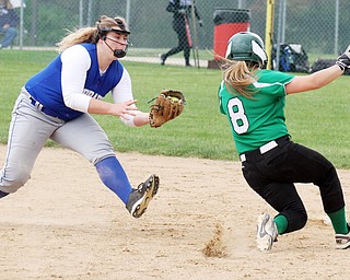 William d Lewis the vindicator  Hubbard'sMorgan Kist (42) tags WB'sMaddie Pidgeon out at 2nd during 5-18-16 game at alliance