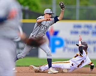 STRUTHERS, OHIO - MAY 18, 2016: Second basemen Jake Gherardi #11 of Fitch keeps his foot on the base to force out Kevin Kukla #6 of Walsh Jesuit in the fifth inning of Wednesday nights game at Cene Park. Walsh Jesuit won 2-1. DAVID DERMER | THE VINDICATOR