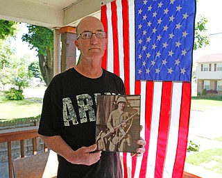   ROBERT K YOSAY | THE VINDICATOR..Robert Wallace who will receive an honorary HS diploma at the Struthers HS graduation ceremony, May 29. Wallace was several credits shy of graduating when he enlisted...Struthers City Schools, in partnership with the Struthers Fallen Soldiers project,.--30-