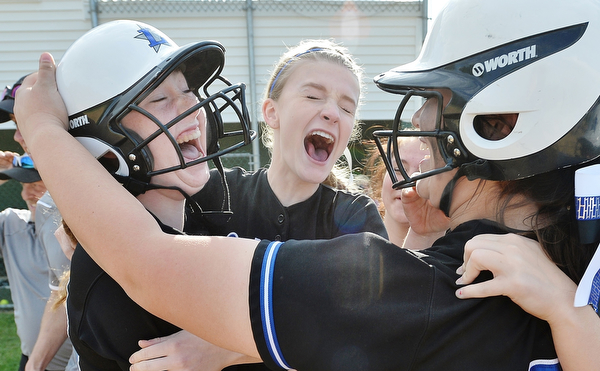 Jeff Lange | The Vindicator  THU, MAY 19, 2016 - (From left) Beady Titus, Meg Stein and Tori Wells celebrate after defeating Hubbard 4-3 in a Division II district championship game at Alliance High School Thursday night.