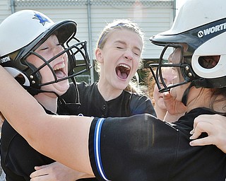 Jeff Lange | The Vindicator  THU, MAY 19, 2016 - (From left) Beady Titus, Meg Stein and Tori Wells celebrate after defeating Hubbard 4-3 in a Division II district championship game at Alliance High School Thursday night.