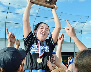 Jeff Lange | The Vindicator  THU, MAY 19, 2016 - Lakeview's lone senior, Madison Buch, is hoisted on the shoulders of her teammates after the Bulldogs defeated Hubbard 4-3 in a Division II district championship game Thursday at Alliance High School.