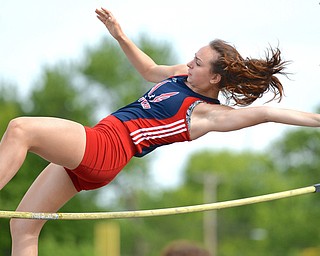 Jeff Lange | The Vindicator  FRI, MAY 20, 2016 - Austintown Fitch's Dominique Digiaconx clears the bar in the girls pole vault event during Friday night's Division I district track meet at Austintown Fitch High School.