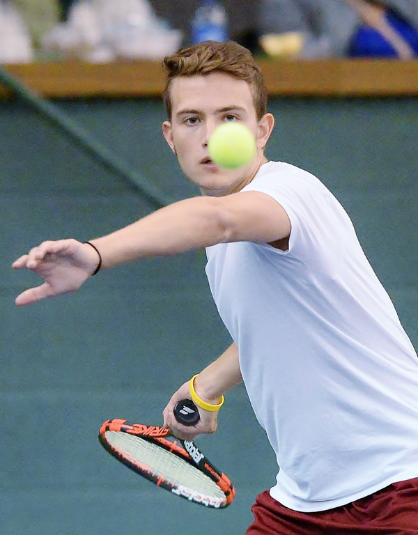 Jeff Lange | The Vindicator  SAT, MAY 14, 2016 - Mooney's Andrew Stille stares down the ball as he prepares to hit it back over the net during a doubles match with teammate Jacob Stefko against Poland's Sam Scotford and Sam Delatore Saturday morning at Boardman Tennis Center.