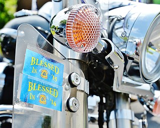 Jeff Lange | The Vindicator  SUN, MAY 22, 2016 - Those who came out to First Baptist Church of Hubbard's second annual Blessing of the Bikes received a decal to commemorate the event Sunday morning at the church in Hubbard.