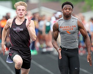 William D Lewis The Vindicator Boardman's Brendon Lucas, left, and Massilon's Deionne HArper compete in prelims of 100 meter dash during 5-25-16 regional meet at Fitch