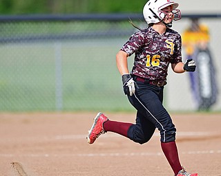 MASSILLON, OHIO - MAY 25, 2016: Base runner Hanna Dennison #16 of South Range sprints to third base before heading home to score on a double by Felecia Gaeta #1 in the first inning of Wednesday nights Regional Semi-Final game at Massillon Washington High School. DAVID DERMER | THE VINDICATOR