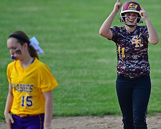 MASSILLON, OHIO - MAY 25, 2016: Morgan Smith #11 of South Range celebrates on second base after hitting a double in the fourth inning of Wednesday nights Regional Semi-Final game at Massillon Washington High School. DAVID DERMER | THE VINDICATOR..Megan Turner #15 of Champion pictured.