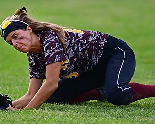 MASSILLON, OHIO - MAY 25, 2016: Left fielder Morgan Czopur #20 of South Range dives to catch the ball for the out in the seventh inning of Wednesday nights Regional Semi-Final game at Massillon Washington High School. DAVID DERMER | THE VINDICATOR