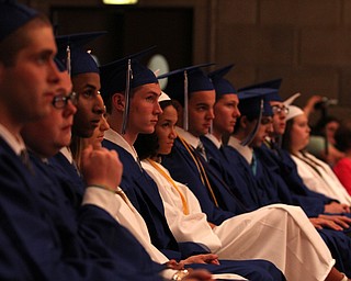 Nikos Frazier | The Youngstown Vindicator..Hubbard graduating students look at the stage before walking across to recieve their dilpomas.
