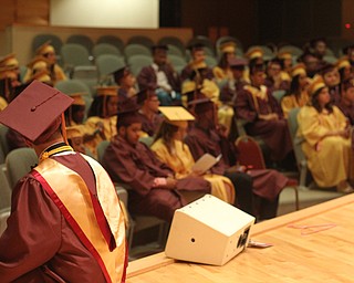 Nikos Frazier | The Youngstown Vindicator..Salam Picard, Liberty High School class of 2016, looks at his classmates before walkign across the stage at Edward W. Powers Auditorium.