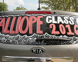            ROBERT  K. YOSAY | THE VINDICATOR..Tiime honored tradition as the car is decorated and painted up ..The Campbell Red Devils  graduated 73 students at ceremonies at the school gym Thursday Evening...-30-