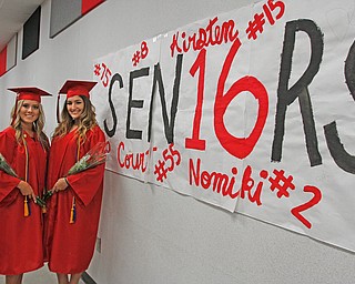            ROBERT  K. YOSAY | THE VINDICATOR..Leaders --- Salutatorian and Valedictorian Courtney Michaels and Kalliope Zembillas --(ok)  The Campbell Red Devils  graduated 73 students at ceremonies at the school gym Thursday Evening...-30-