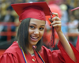           ROBERT  K. YOSAY | THE VINDICATOR..Changing the tassel.. signifiying graduation  is Celine Hildack..The Campbell Red Devils  graduated 73 students at ceremonies at the school gym Thursday Evening...-30-